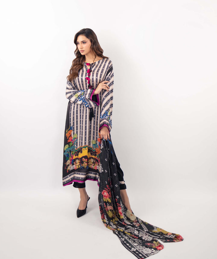 Women's White Monochrome Striped Kurti with Vibrant Floral Hem and Tassel Detail